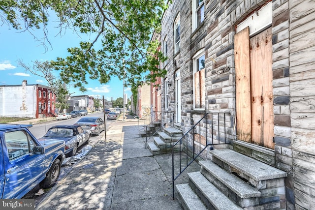 1827 Eagle St, Baltimore, MD 21223 - view of road featuring entry steps, sidewalks, street lights, and curbs