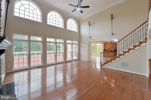 6 Applewood Ct, Hainesport, NJ 08036 - unfurnished living room with ceiling fan, hardwood / wood-style floors, stairs, ornamental molding, and baseboards