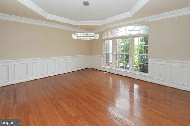 6 Applewood Ct, Hainesport, NJ 08036 - unfurnished room with wood finished floors, a wainscoted wall, crown molding, and a decorative wall