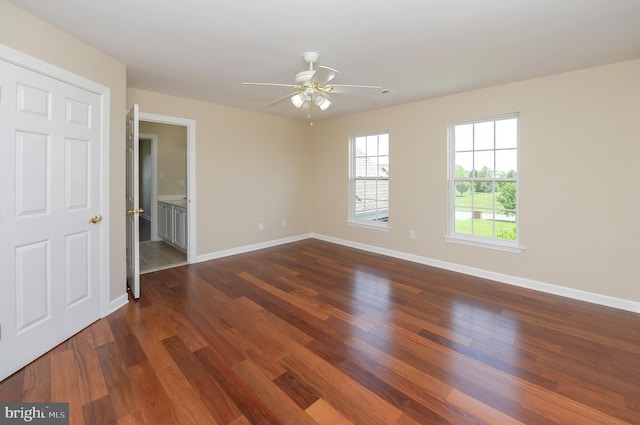 6 Applewood Ct, Hainesport, NJ 08036 - unfurnished bedroom with dark wood-style floors, baseboards, and ceiling fan