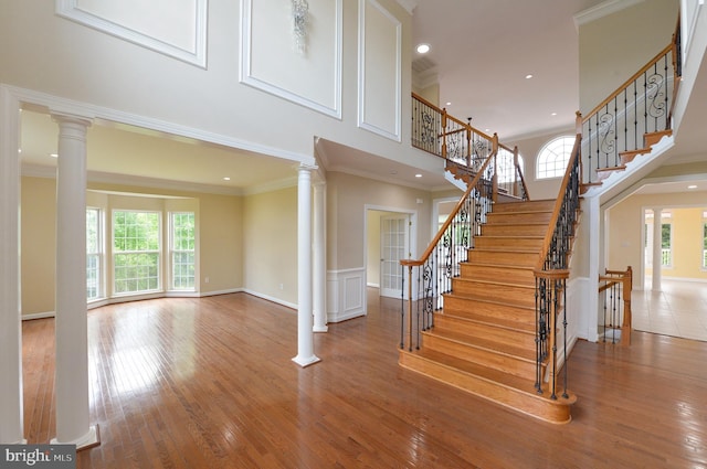 6 Applewood Ct, Hainesport, NJ 08036 - staircase featuring ornate columns, healthy amount of natural light, recessed lighting, ornamental molding, and wood finished floors