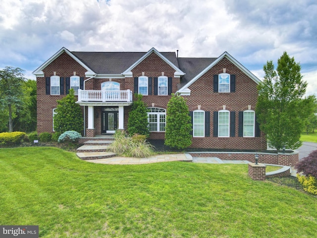 6 Applewood Ct, Hainesport, NJ 08036 - colonial house featuring a balcony, brick siding, and a front lawn