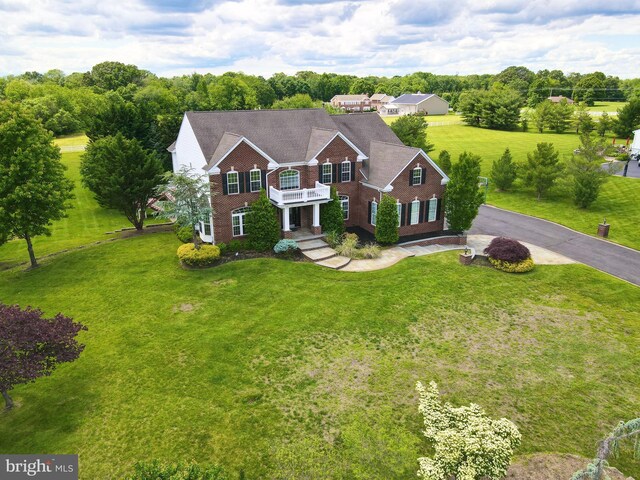 6 Applewood Ct, Hainesport, NJ 08036 - colonial inspired home with a balcony, brick siding, a front lawn, and asphalt driveway