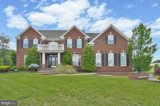 6 Applewood Ct, Hainesport, NJ 08036 - colonial house featuring brick siding, a front lawn, and a balcony
