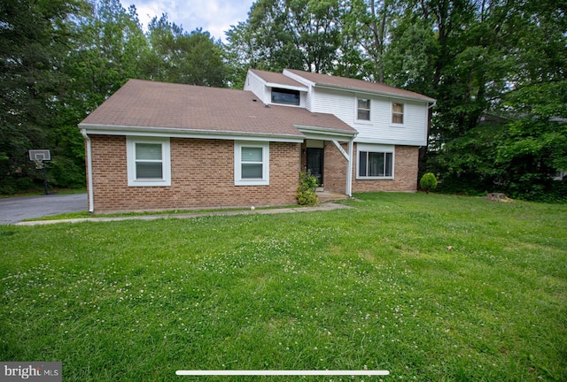 330 Troon Rd, Dover, DE 19904 - traditional-style home featuring a front yard and brick siding