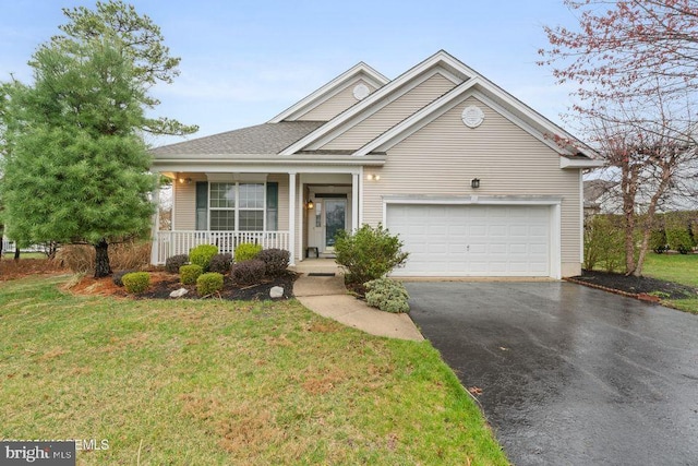 52 Whitewater Dr, Barnegat, NJ 08005 - traditional-style home featuring driveway, a porch, a front yard, and an attached garage