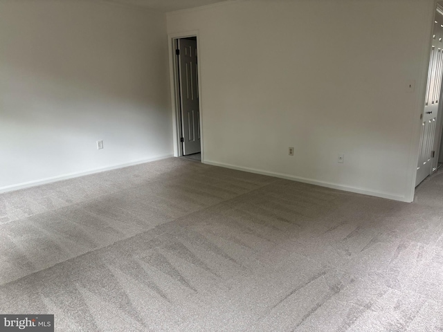 476 Colonial Ridge Ln, Arnold, MD 21012 - spare room featuring carpet and baseboards