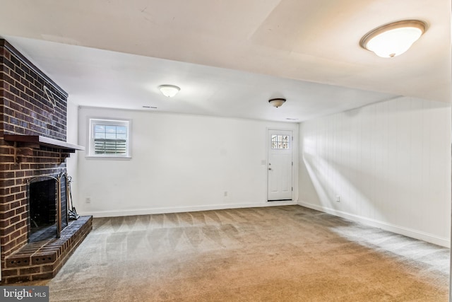 476 Colonial Ridge Ln, Arnold, MD 21012 - unfurnished living room featuring a fireplace, carpet flooring, and baseboards