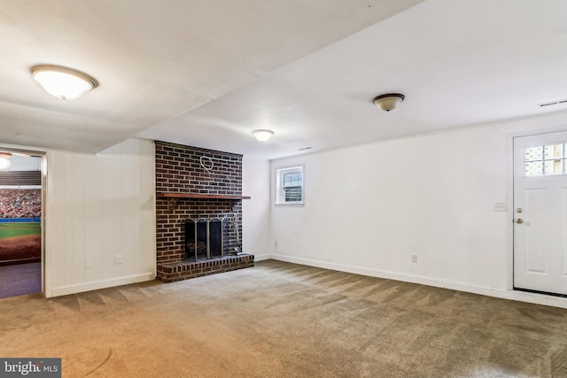 476 Colonial Ridge Ln, Arnold, MD 21012 - unfurnished living room featuring carpet flooring, a brick fireplace, healthy amount of natural light, and baseboards
