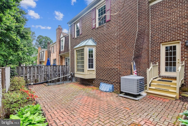 476 Colonial Ridge Ln, Arnold, MD 21012 - view of patio / terrace with fence, cooling unit, and entry steps