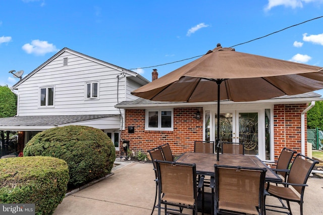 view of patio with french doors and outdoor dining area