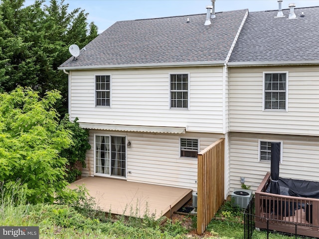 2079 Stoneleigh Dr, Winchester, VA 22601 - back of property featuring a wooden deck, roof with shingles, and cooling unit