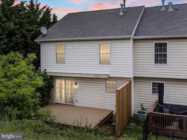 2079 Stoneleigh Dr, Winchester, VA 22601 - rear view of house with a shingled roof, central AC unit, and a patio area