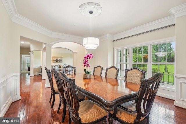 13330 Darnestown Rd, Darnestown, MD 20878 - dining room with ornate columns, dark wood-type flooring, a wainscoted wall, crown molding, and a decorative wall