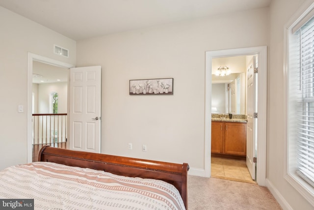 13330 Darnestown Rd, Darnestown, MD 20878 - bedroom with light colored carpet, baseboards, and connected bathroom
