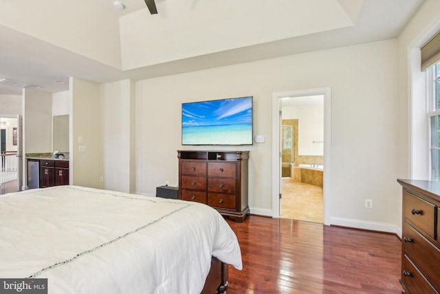 13330 Darnestown Rd, Darnestown, MD 20878 - bedroom with dark wood finished floors, connected bathroom, and baseboards