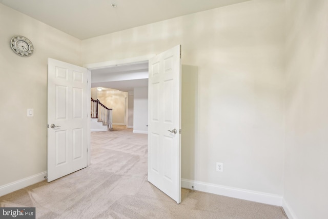 13330 Darnestown Rd, Darnestown, MD 20878 - unfurnished room featuring light carpet, baseboards, and stairs