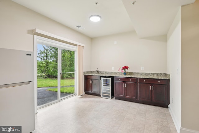 13330 Darnestown Rd, Darnestown, MD 20878 - indoor dry bar with freestanding refrigerator, wine cooler, and baseboards