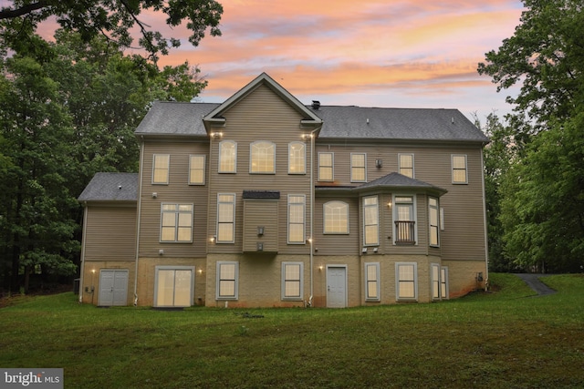 13330 Darnestown Rd, Darnestown, MD 20878 - back of property at dusk with a yard and a shingled roof