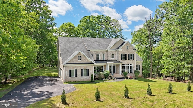 13330 Darnestown Rd, Darnestown, MD 20878 - view of front of house featuring brick siding, driveway, and a front yard