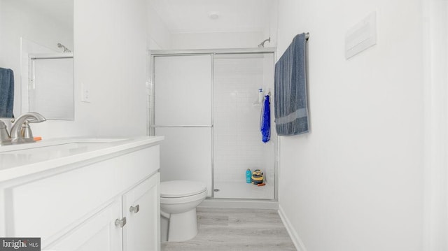 1214 Peterson Way, Absecon, NJ 08201 - full bath featuring toilet, vanity, wood finished floors, and a shower stall