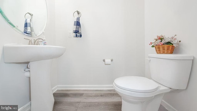 1214 Peterson Way, Absecon, NJ 08201 - bathroom with baseboards, toilet, and wood finished floors