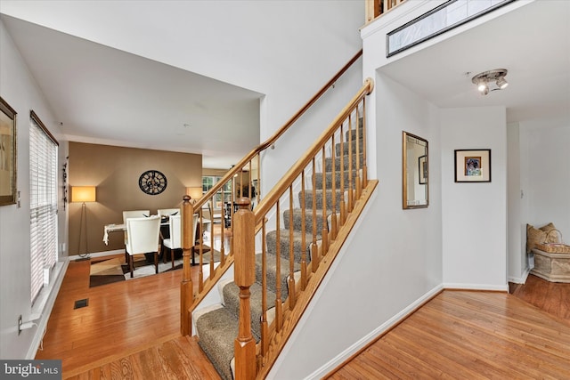 2217 Tidal View Garth, Abingdon, MD 21009 - stairs with wood finished floors, healthy amount of natural light, and baseboards