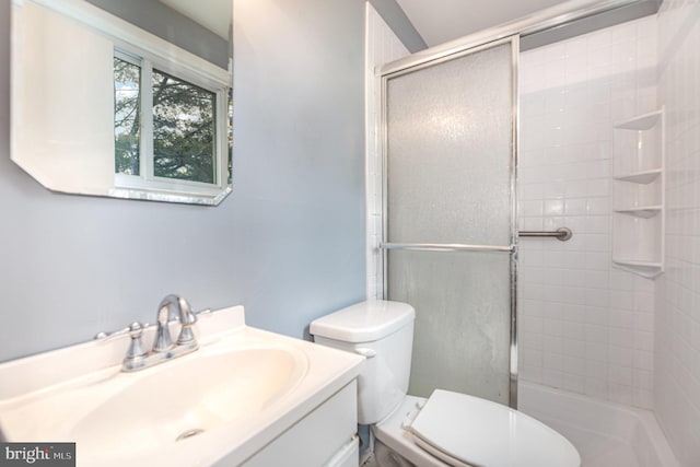 9005 Fieldchat Rd, Baltimore, MD 21236 - bathroom featuring a stall shower, vanity, and toilet
