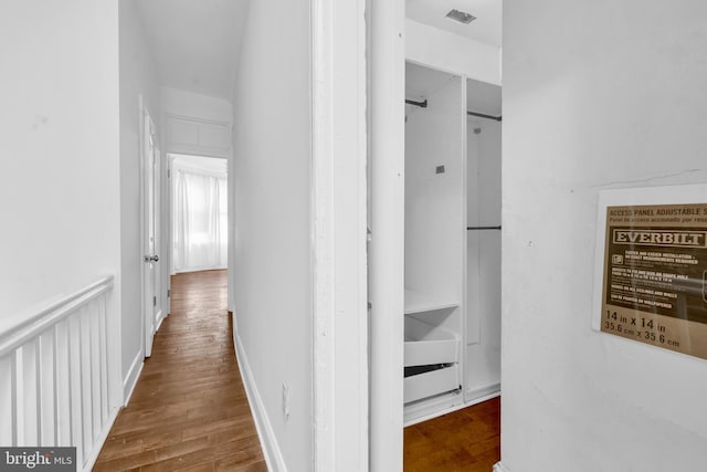 hall featuring wood finished floors
