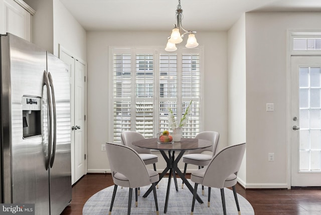42189 Shorecrest Ter, Aldie, VA 20105 - dining area featuring plenty of natural light, baseboards, dark wood-style floors, and a chandelier