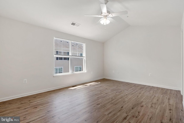 42189 Shorecrest Ter, Aldie, VA 20105 - empty room featuring lofted ceiling, ceiling fan, wood finished floors, and baseboards