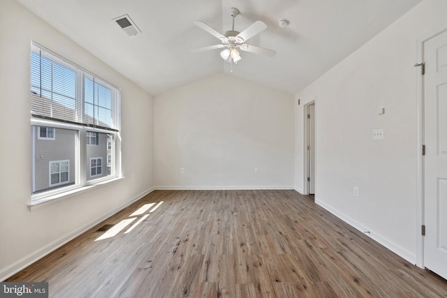 42189 Shorecrest Ter, Aldie, VA 20105 - spare room with wood finished floors, a ceiling fan, baseboards, and vaulted ceiling