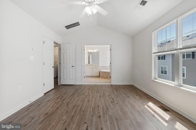 42189 Shorecrest Ter, Aldie, VA 20105 - unfurnished bedroom featuring wood finished floors, lofted ceiling, baseboards, ensuite bath, and ceiling fan