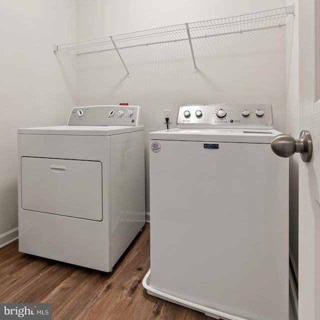 42189 Shorecrest Ter, Aldie, VA 20105 - washroom with washer and dryer and dark wood-style flooring