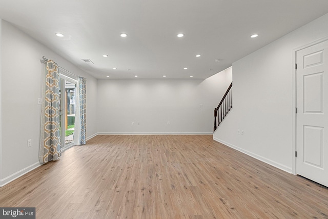 42189 Shorecrest Ter, Aldie, VA 20105 - unfurnished living room featuring recessed lighting, light wood-type flooring, baseboards, and stairs