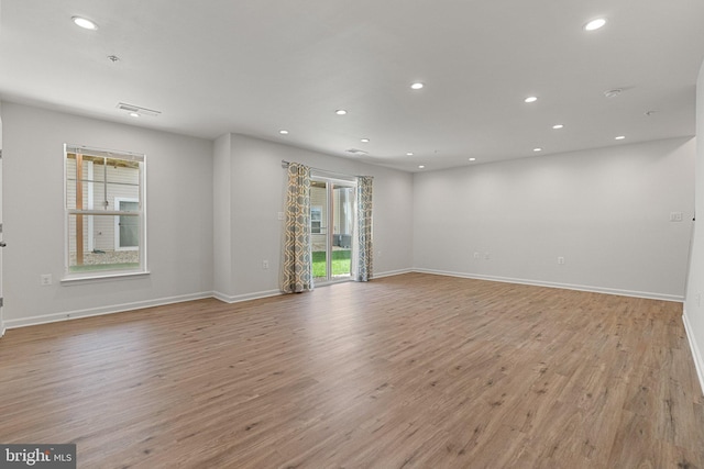 42189 Shorecrest Ter, Aldie, VA 20105 - empty room featuring plenty of natural light, recessed lighting, light wood-style flooring, and baseboards