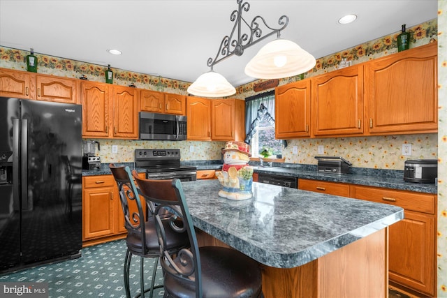 1418 Deer Meadow Ln, Garnet Valley, PA 19060 - kitchen with black appliances, dark countertops, brown cabinets, decorative light fixtures, and a kitchen island