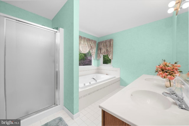 1418 Deer Meadow Ln, Garnet Valley, PA 19060 - bathroom featuring double vanity, a bath, a shower stall, and tile patterned floors