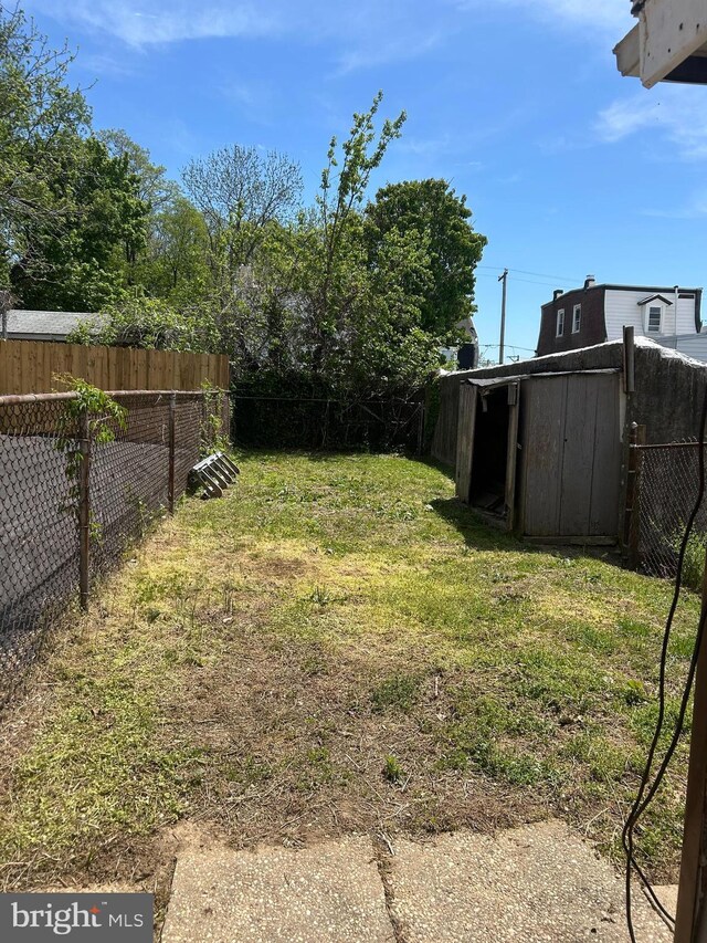 4415 Elizabeth St, Philadelphia, PA 19124 - view of yard featuring a storage shed and an outdoor structure