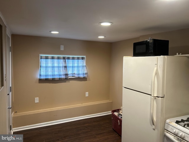4415 Elizabeth St, Philadelphia, PA 19124 - kitchen with white appliances, wood finished floors, recessed lighting, and baseboards