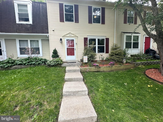 18628 Winding Creek Pl, Germantown, MD 20874 - view of front of home with a front lawn and a shingled roof