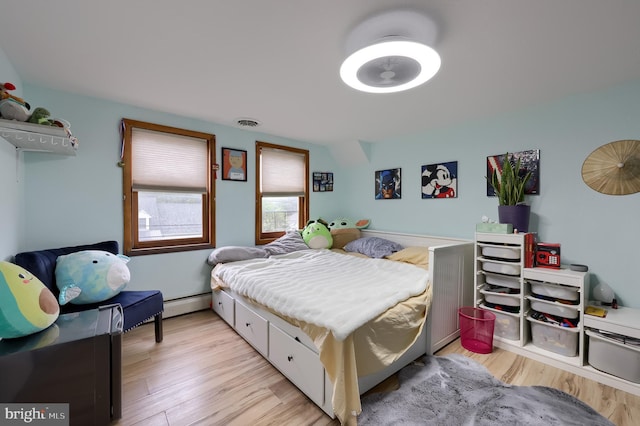 208 Clark Rd, Hershey, PA 17033 - bedroom featuring light wood-style flooring and a baseboard radiator