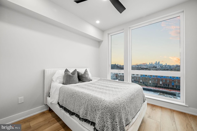2201 E Somerset St Unit B3Upper, Philadelphia, PA 19134 - bedroom featuring wood finished floors, baseboards, a city view, recessed lighting, and a ceiling fan