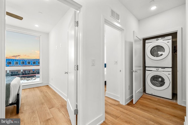 2201 E Somerset St Unit B3Lower, Philadelphia, PA 19134 - washroom featuring estacked washer and dryer, light wood-style flooring, recessed lighting, and baseboards