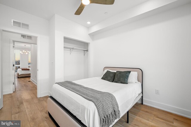 2201 E Somerset St Unit B3Lower, Philadelphia, PA 19134 - bedroom with wood finished floors, a closet, a chandelier, baseboards, and ceiling fan