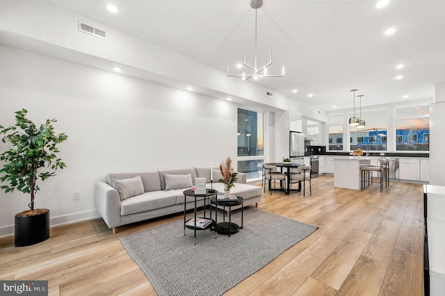 2201 E Somerset St Unit B3Lower, Philadelphia, PA 19134 - living room featuring recessed lighting, light wood-style floors, a chandelier, and baseboards