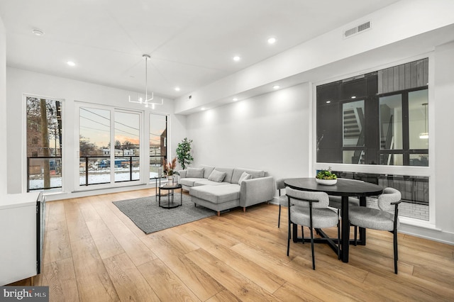 2201 E Somerset St Unit B3Lower, Philadelphia, PA 19134 - living room featuring wood finished floors, plenty of natural light, a chandelier, and recessed lighting