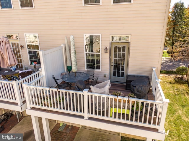 deck featuring outdoor dining area