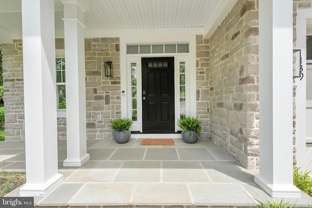 139 Spa Dr, Annapolis, MD 21403 - view of exterior entry featuring covered porch and stone siding