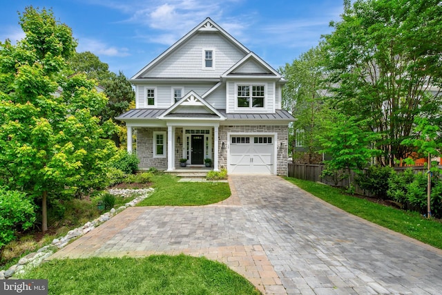 139 Spa Dr, Annapolis, MD 21403 - craftsman-style home featuring a standing seam roof, decorative driveway, stone siding, and metal roof